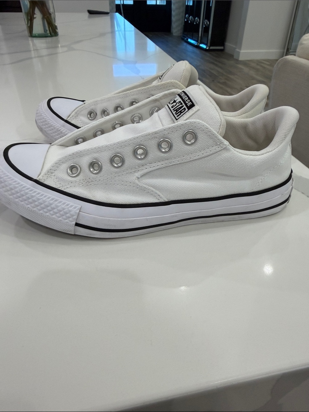 Converse White Low-Top Slip-On Canvas Sneakers with Black Trim - Picture 4 of 10